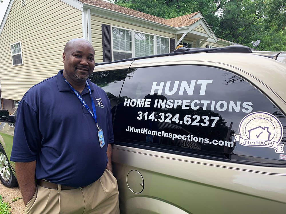 InterNACHI Certified Home Inspectors John Hunt next to his van