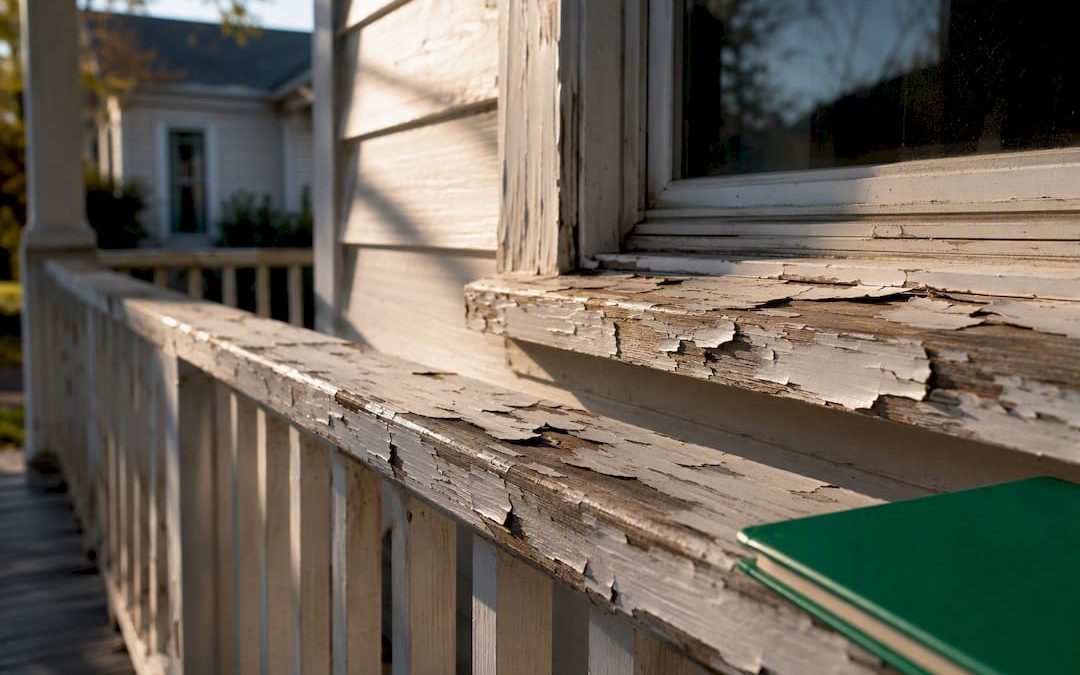 Peeling paint on an older home porch
