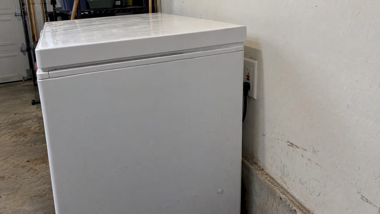 Freezer partially blocks access to GFCI outlet